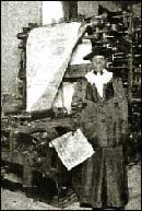 Flora Sengstacke, mother of Robert Abbott, with one of the first papers to come off its press in 1921